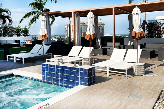 Pool cabanas and hot tub